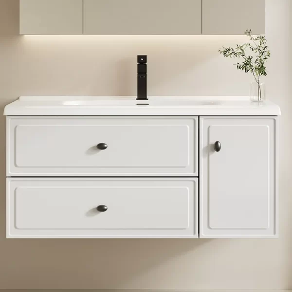 white bathroom cabinet with two drawers and one door